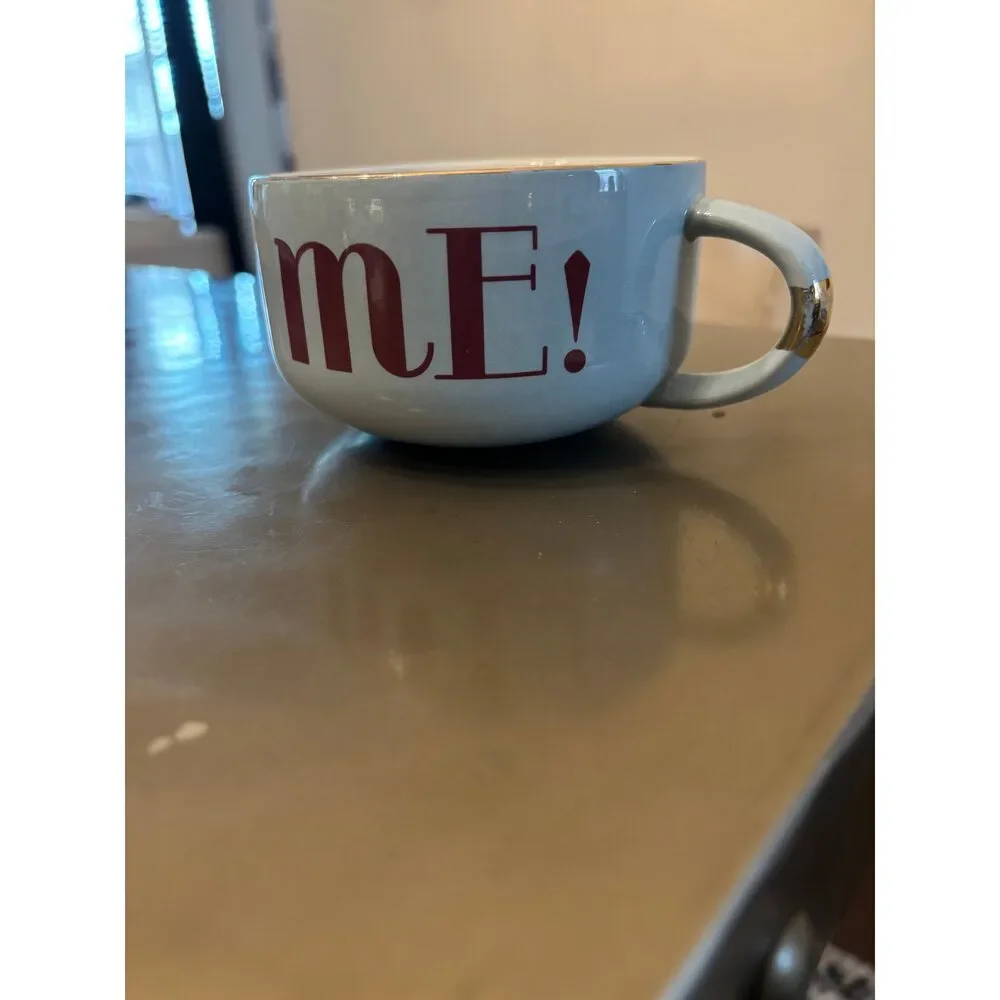 Anthropology Light blue and brown “mE!” mug